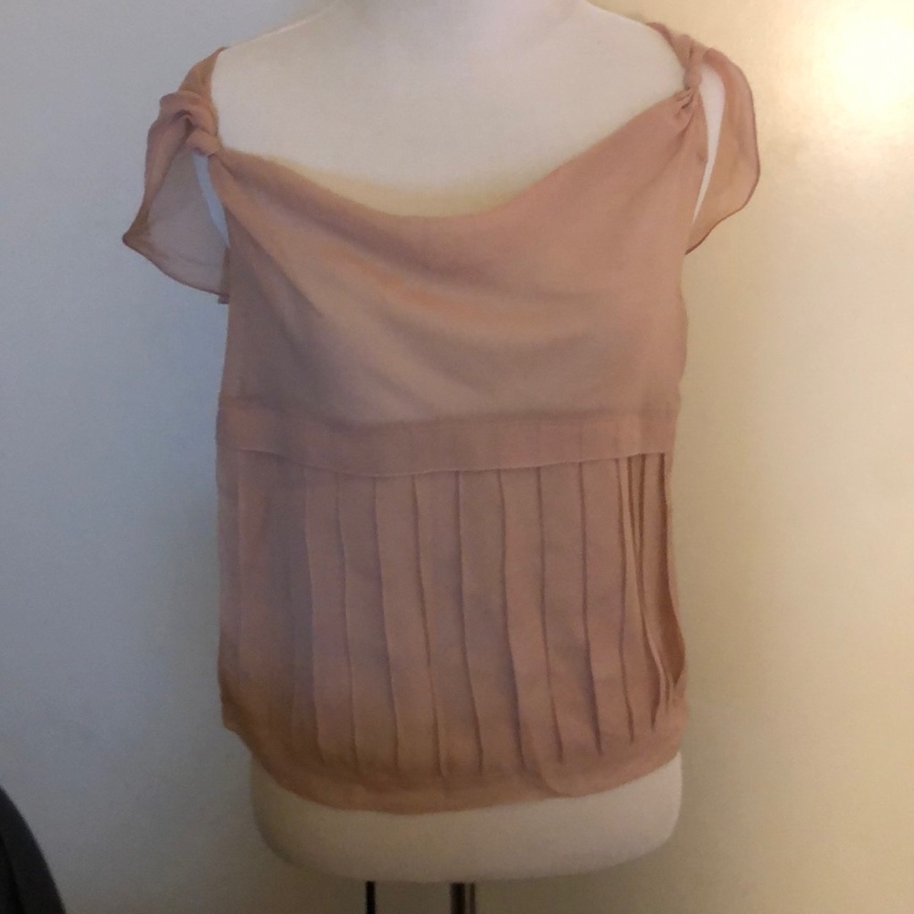 Pink sleeveless blouse